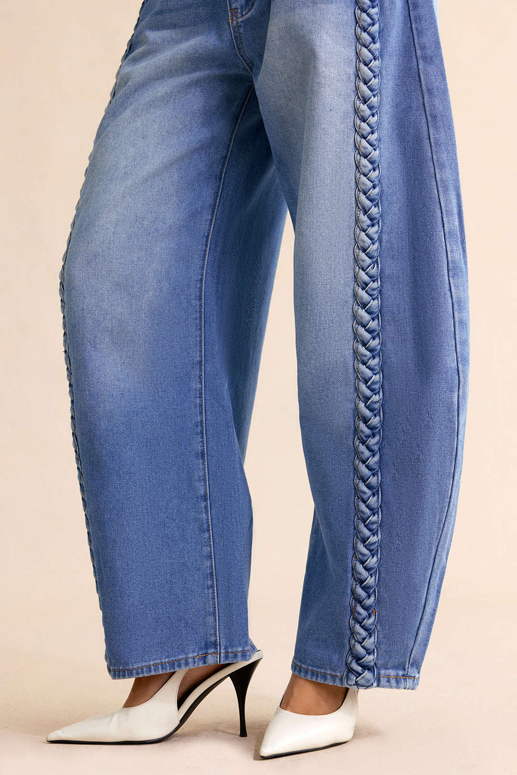 Vaqueros de denim con cremallera trenzada