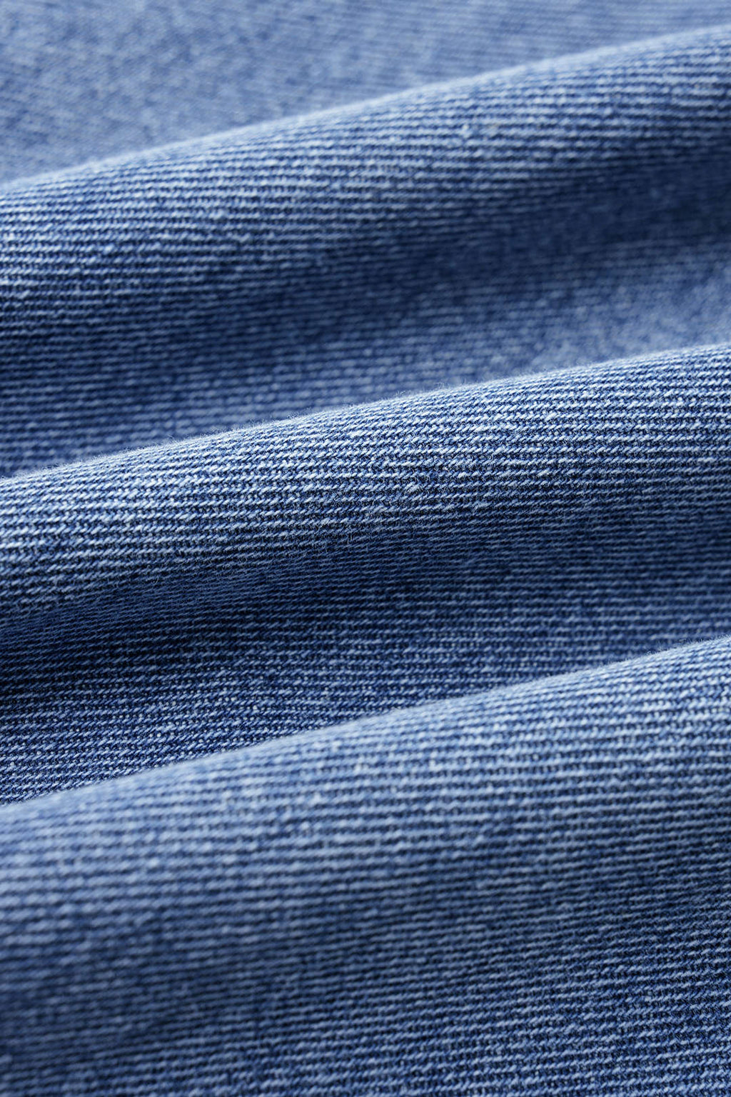 Vaqueros de denim con cremallera trenzada